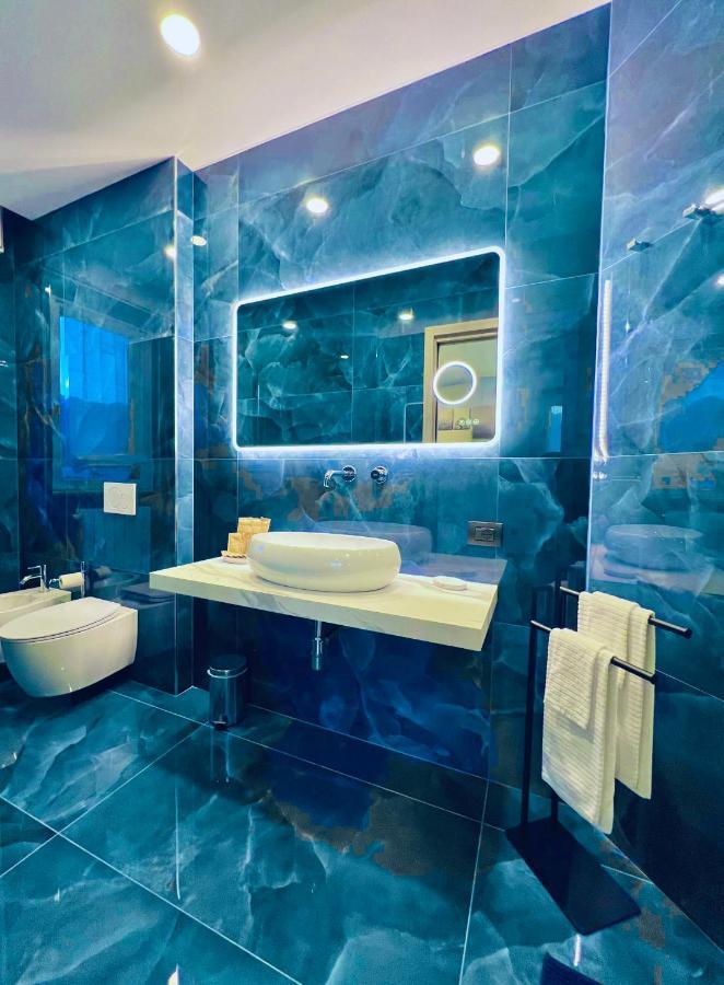 La Tana Del Ludo Apartment บาเวโน ภายนอก รูปภาพ